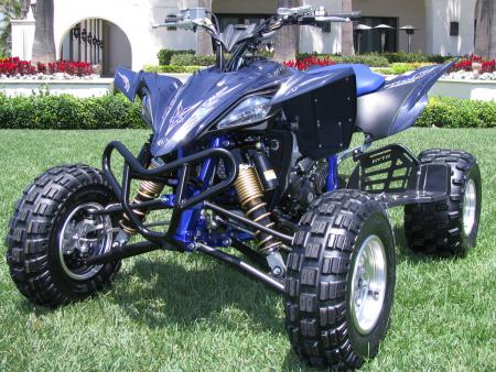 The muted blue plastic and GYTR heel guards make the YFZ450R SE stand out.