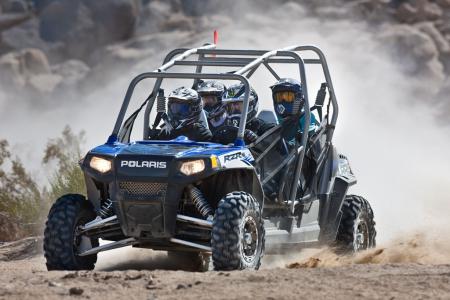 The RZR 4 features Fox Podium X 2.0 piggyback reservoir shocks with 12 inches of travel.