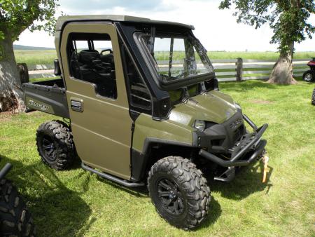 This Ranger XP has been decked out with a new fully enclosed cab featuring roll-down windows.