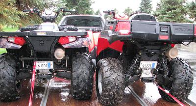 Note how the X2 shocks mount differently than the standard Sportsman shock at left.
