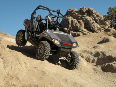 Thanks to its 60-inch width and long-travel suspension, the RZR S is capable of a little rock crawling when you’re tired of going fast.