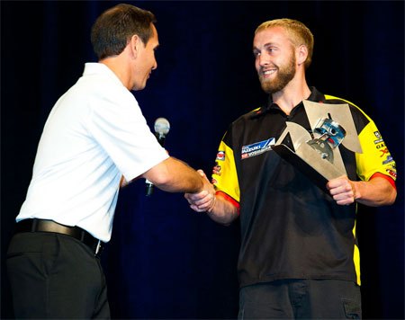 Josh Creamer accepts the trophy.
